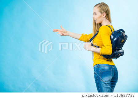 Young woman going to school 113687782