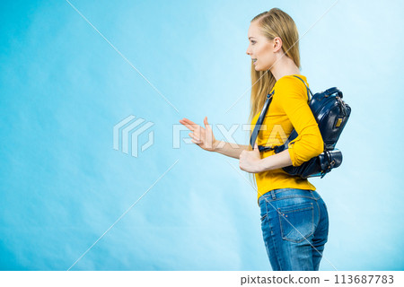 Young woman going to school 113687783