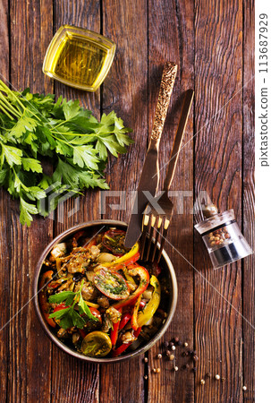 Summer vegan tomato salad with parsley, red onion, garlic, pepper and olive oil dressing Summer vegan tomato salad with parsley, red onion, garlic, pepper and olive oil dressing 113687929