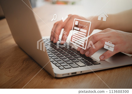 Man typing on a laptop. Invoice concept 113688300