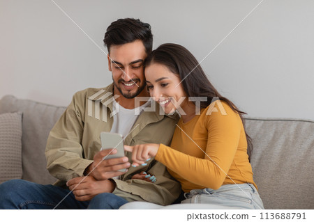 Couple using smartphone during therapy session, online help Couple using smartphone during therapy session, online help 113688791