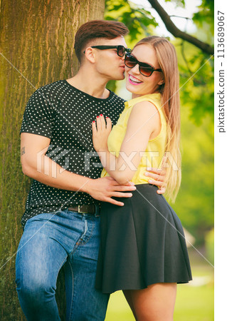 Happy couple in park 113689067