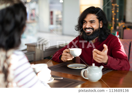 Romantic eastern couple on first date at canteen 113689136