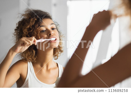 Afro Woman Brushing Teeth In Bathroom, Panorama Afro Woman Brushing Teeth In Bathroom, Panorama 113689258