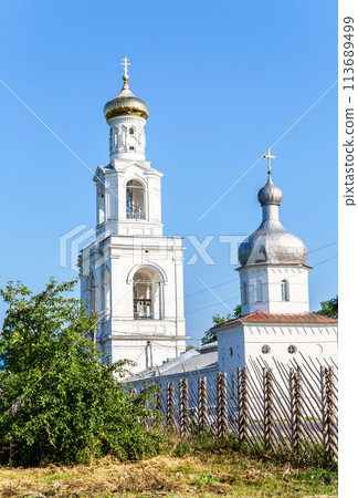 Bell tower of the St. George (Yuriev) Orthodox Male Monastery in summer Bell tower of the St. George (Yuriev) Orthodox Male Monastery in summer 113689499