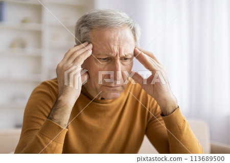 Elderly man with thoughtful facial expression Elderly man with thoughtful facial expression 113689500