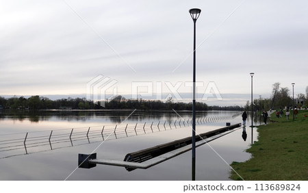 Kyiv, Ukraine April 17, 2023: Flooding - flooding of the embankment in a new area in the city of Kyiv 113689824