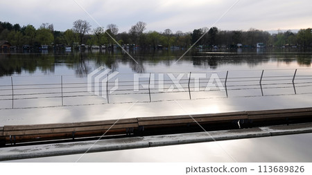 Kyiv, Ukraine April 17, 2023: Flooding - flooding of the embankment in a new area in the city of Kyiv Kyiv, Ukraine April 17, 2023: Flooding - flooding of the embankment in a new area in the city of Kyiv 113689826