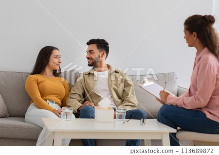 Couple in therapy session with counselor, crisis in relationships Couple in therapy session with counselor, crisis in relationships 113689872