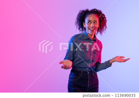 Woman with open hands in denim jacket and smile Woman with open hands in denim jacket and smile 113690035