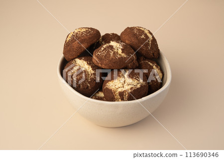 Cinnamon crinkle cookies in a bowl Cinnamon crinkle cookies in a bowl 113690346