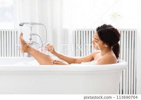 Relaxing spa day with a luxurious bath 113690704