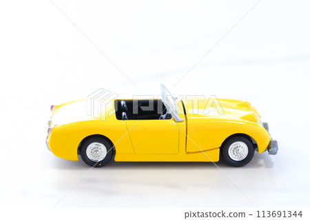 Image of a leisurely road trip in a yellow convertible for two Image of a leisurely road trip in a yellow convertible for two 113691344