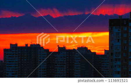 Evening city with red rays and sky 113691521