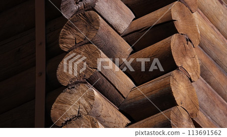 Kiev Ukraine February 23, 2019: House of wooden logs laying corner background 113691562