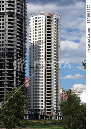 Kiev, Ukraine July 24, 2020: Abandoned unfinished, apartment, high-rise buildings in Kiev Kiev, Ukraine July 24, 2020: Abandoned unfinished, apartment, high-rise buildings in Kiev 113691571