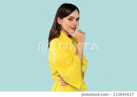 Thoughtful young woman confidently smiling, touching face and thinking about something Thoughtful young woman confidently smiling, touching face and thinking about something 113691617