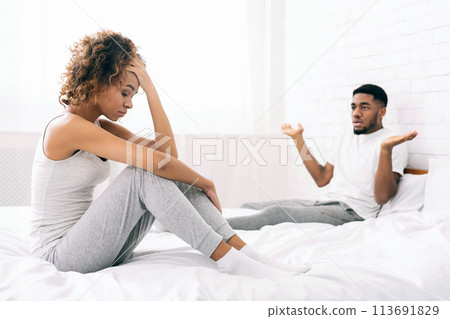 Young couple in bed having problems and crisis 113691829