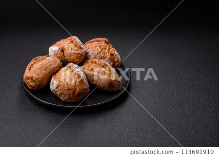 Fresh baked bread buns with salt, spices, seeds and grains 113691910