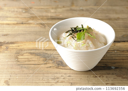 Sea bream chazuke with mitsuba, shredded nori seaweed, and wasabi before adding the dashi broth Sea bream chazuke with mitsuba, shredded nori seaweed, and wasabi before adding the dashi broth 113692356