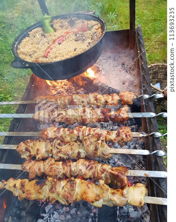 Grill barbecue kebab and pilaf food outdoor Grill barbecue kebab and pilaf food outdoor 113693235