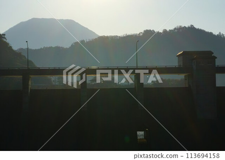 Sanbe Dam embankment and Mt. Sanbe 113694158