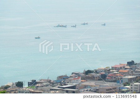 Sagami Bay and a flock of fishing boats offshore as seen from Ninomiya Azumayama Park Sagami Bay and a flock of fishing boats offshore as seen from Ninomiya Azumayama Park 113695548