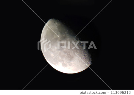 Half Moon on black Background. The Moon natural satellite 113696213