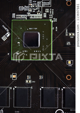 A brown printed circuit board with a processor chip and video memory strips. Electronic components on the graphics card. A brown printed circuit board with a processor chip and video memory strips. Electronic components on the graphics card. 113697881
