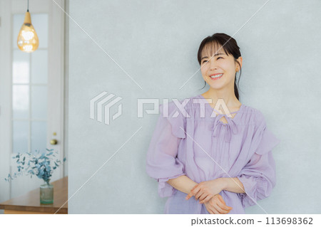 Woman in purple blouse 113698362