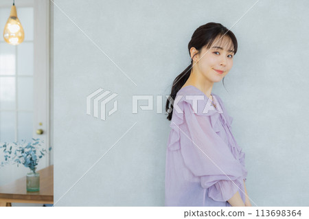 Woman in purple blouse 113698364