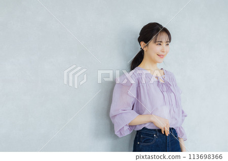 Woman in purple blouse 113698366