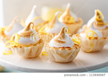 Lemon meringue tarts, one bite desserts idea 113698987