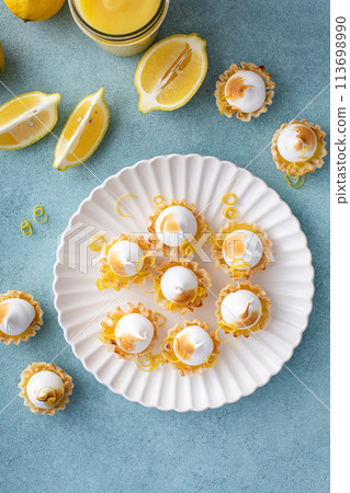 Lemon meringue tarts, one bite desserts idea 113698990