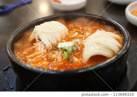noodles with korean gimchi jjigae 113699328