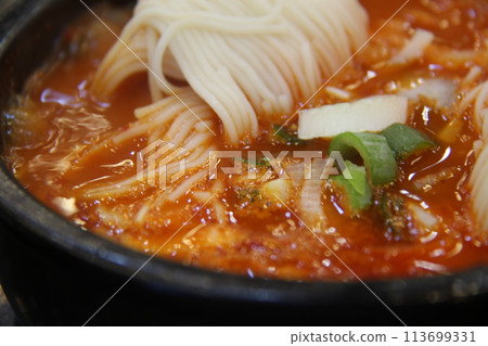 noodles with korean gimchi jjigae 113699331