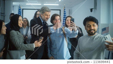 Multiethnic US citizens take selfies with presidential candidate at polling station Multiethnic US citizens take selfies with presidential candidate at polling station 113699441