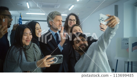 Diverse people take pictures with presidential candidate after voting Diverse people take pictures with presidential candidate after voting 113699485
