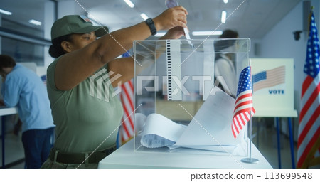 Multiethnic voters or American people vote in booths at polling station Multiethnic voters or American people vote in booths at polling station 113699548