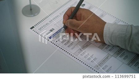 African American man votes for Donald Trump on paper ballot African American man votes for Donald Trump on paper ballot 113699751