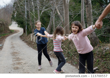 Happy children. Cute little girl outdoor Happy children. Cute little girl outdoor 113700557