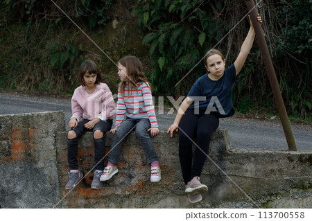 Bored children. Cute little girl outdoor Bored children. Cute little girl outdoor 113700558