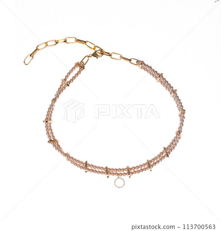 Gold choker necklace with pearls isolated on white background 113700563