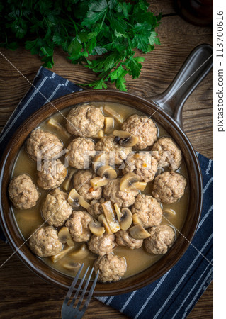 Delicious homemade swedish meatballs with mushroom cream sauce. 113700616