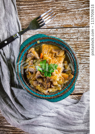 Stewed pork loin with mushrooms. Stewed pork loin with mushrooms. 113700618