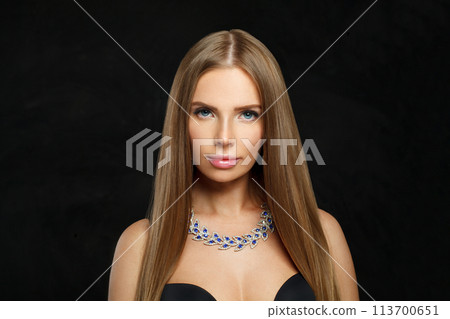 Glamorous jewelry model beautiful woman portrait. Brunette woman with long smooth hair and necklace 113700651