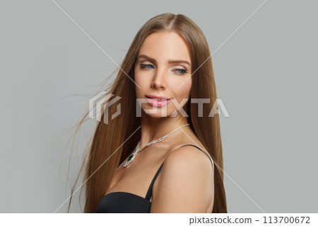 Celebrity jewelry model beautiful woman portrait. Brunette woman with long smooth hair and necklace Celebrity jewelry model beautiful woman portrait. Brunette woman with long smooth hair and necklace 113700672