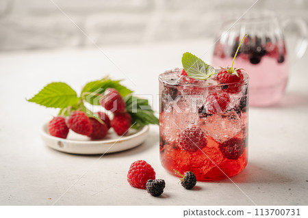 Glass of berry cocktail 113700731