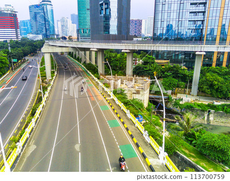 An aerial view of LRT track above on Kuningan Street, Jakarta. An aerial view of LRT track above on Kuningan Street, Jakarta. 113700759