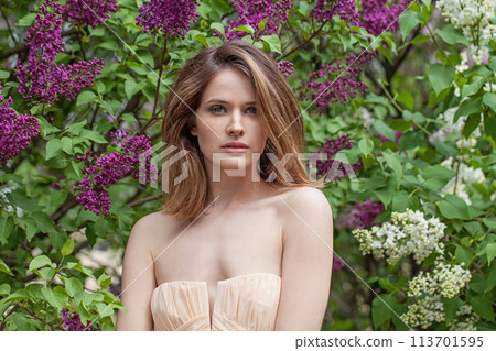 Beautiful spring woman enjoying nature outdoor, fashion beauty portrait Beautiful spring woman enjoying nature outdoor, fashion beauty portrait 113701595